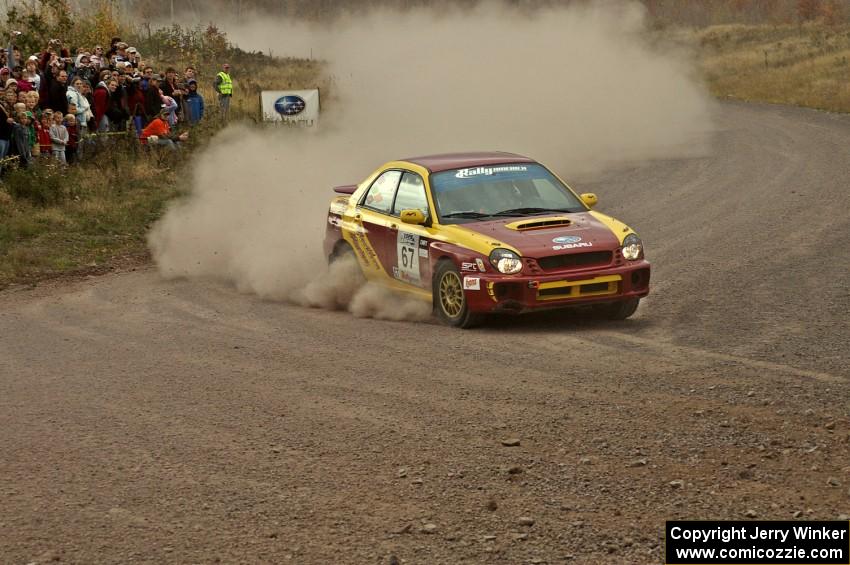 Bryan Pepp / Jerry Stang set up their Subaru WRX for a hard left at the spectator point on SS1.