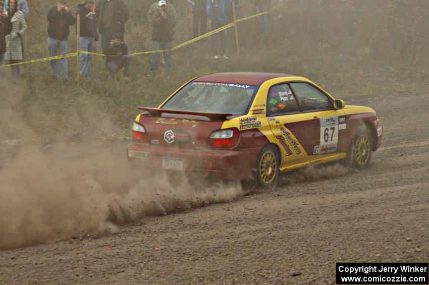 Bryan Pepp / Jerry Stang accelerate their Subaru WRX from a left-hander at the spectator point on SS1.