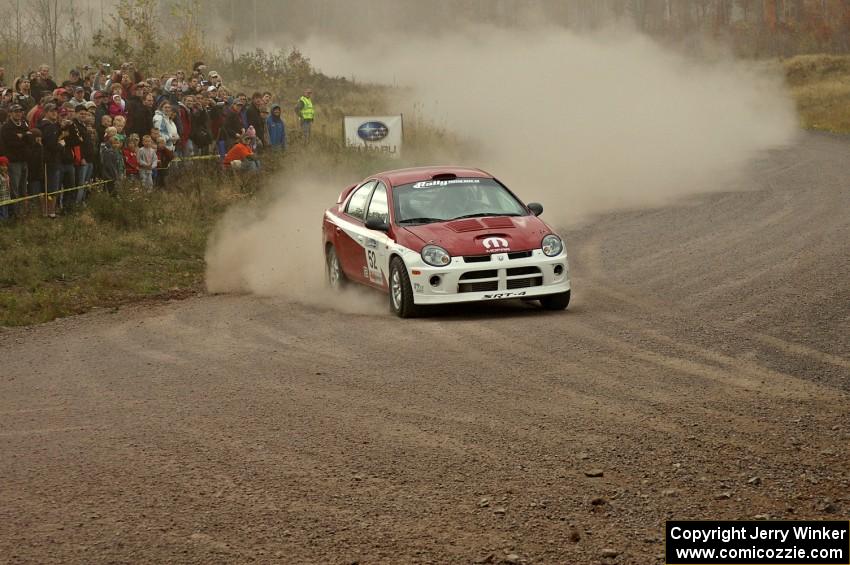 Doug Shepherd / Karen Wagner prepare for a hard left at the spectator point of SS1 in their Dodge SRT-4.