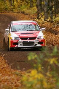 Arkadiusz Gruszka / Michal Chodan at speed down a straight on SS2, Beacon Hill, in their Mitsubishi Lancer Evo 9.