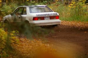 Greg Woodside / Tom Woodside drift their Dodge Shadow through one of the final corners of SS2, Beacon Hill.