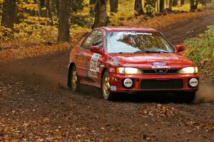 Matt Marker / Ben Slocum drift their Subaru Impreza through a sweeper on SS2, Beacon Hill.