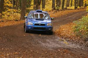 Slawomir Balda / Janusz Topor drift through a sweeper on SS2, Beacon Hill, in their Subaru WRX.