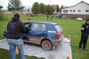 Paul Koll / Carl Seidel pull into service at the first Kenton service in their VW Golf.