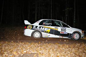 Andi Mancin / Maciej Wislawski fly into the finish of SS5 in their Mitsubishi Evo 9.