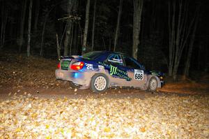 The Heath Nunnemacher / Travis Hanson Subaru WRX blasts down a leaf covered road near the finish of SS5.