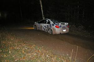 Zach Babcock / Jeff Miller sport fresh damage on their Dodge SRT-4 on SS5.