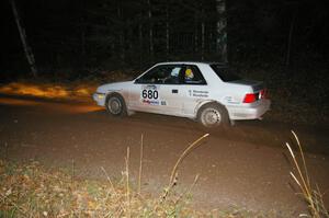 Greg Woodside / Tom Woodside fly into the finish of SS5 in their Dodge Shadow.