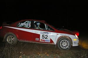 Doug Shepherd / Karen Wagner drift through a 90-right at the spectator point on SS7 in their Dodge SRT-4.