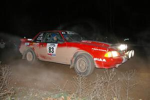 The Mark Utecht / Rob Bohn Ford Mustang prepares for a 90-right on SS7.