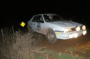 Greg Woodside / Tom Woodside fling their Dodge Shadow through a 90-right at the spectator location on SS7.