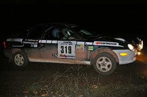 Chris Greenhouse / Don DeRose slide through a 90-right at the spectator location on SS7 in their Plymouth Neon.