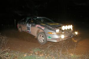 Spencer Prusi / Mike Amicangelo drift through a 90-right at the spectator location on SS7 in their Eagle Talon.