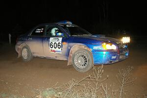 Slawomir Balda / Janusz Topor drift through a 90-right at the spectator point on SS7 in their Subaru WRX.