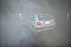 Exhaust smoke in the sub-freezing temps cloud the Michel Hoche-Mong / Jimmy Brandt VW GTI at the start of SS9, Menge Creek.
