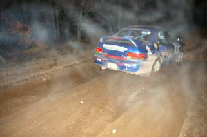 Kazimierz Pudelek / Lukasz Wronski accelerate their Subaru Impreza from the start of SS9, Menge Creek.
