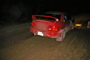 Dustin Kasten / Dave Parps blast away from the start of SS9, Menge Creek, in their Subaru Impreza.