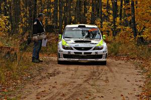 The Ken Block / Alex Gelsomino Subaru WRX STi checks into the finish of SS10, Gratiot Lake 1.