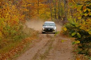 The Andi Mancin / Maciej Wislawski Mitsubishi Evo 9 blasts down the final straight into the finish of SS10, Gratiot Lake 1.