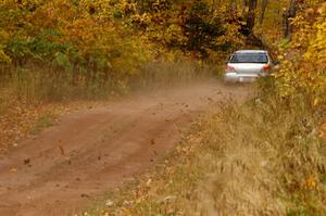 The Piotr Wiktorczyk / Alan Dolan Subaru WRX STi blasts into the finish of SS10, Gratiot Lake 1.