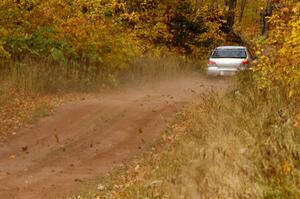 The Piotr Wiktorczyk / Alan Dolan Subaru WRX STi blasts into the finish of SS10, Gratiot Lake 1.