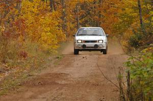 Greg Woodside / Tom Woodside at speed into the finish of SS10, Gratiot Lake 1, in their Dodge Shadow.