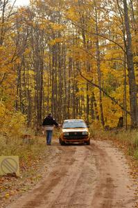 The Chad Eixenberger / Jay Luikart VW Golf checks into the finish of SS10, Gratiot Lake 1.