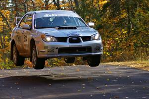 The Piotr Wiktorczyk / Alan Dolan Subaru WRX STi gettting nice air on SS13, Brockway 1.