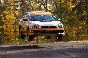 Pat Moro / Mike Rossey catch nice air at the midpoint jump on Brockway 1, SS13, in their Subaru WRX.