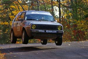Josh Wimpey / Jeremy Wimpey get nice air at the midpoint jump on Brockway 1, SS13, in their VW GTI.