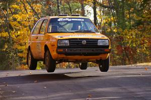 The VW Golf of Chad Eixenberger / Jay Luikart gets nice air at the midpoint jump on Brockway 1, SS13.