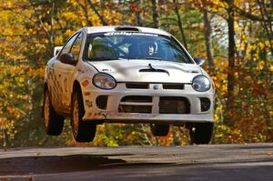 Zach Babcock / Jeff Miller get nice air at the midpoint of SS13, Brockway 1, in their Dodge SRT-4.