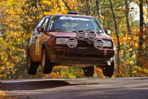 Billy Mann / Josh VanDenHeuvel catch nice air at the midpoint jump on Brockway 1, SS13, in their VW GTI.