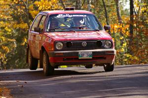 Daryn Chernick / Heidi Nunnemacher get the back-end light at the midpoint jump on Brockway 1, SS13, in their VW GTI.