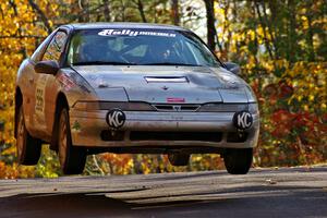 Spencer Prusi / Mike Amicangelo catch nice air at the midpoint jump on Brockway 1, SS13, in their Eagle Talon.