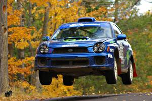 Heath Nunnemacher / Travis Hanson launch their Subaru WRX nicely at the midpoint jump on Brockway 2, SS14.
