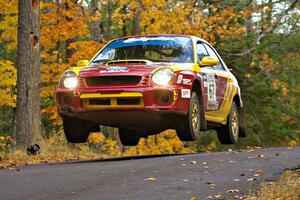 Bryan Pepp / Jerry Stang get their Subaru WRX nicely airborn at the midpoint jump on Brockway 2, SS14.