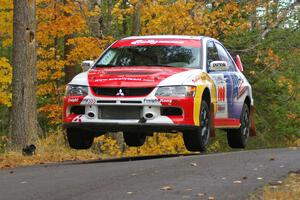 Arkadiusz Gruszka / Michal Chodan get decent air at the midpoint jump on SS14, Brockway 2, in their Mitsubishi Lancer Evo 9.