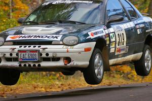 Chris Greenhouse / Don DeRose get nice air in their Plymouth Neon at the midpoint jump on Brockway 2, SS14.