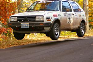 Michel Hoche-Mong / Jimmy Brandt catch major air at the midpoint jump on Brockway 2, SS14, in their VW GTI.