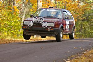 Billy Mann / Josh VanDenHeuvel come down on the left-hand side after the midpoint jump on Brockway 2, SS14, in their VW GTI.