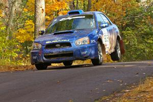 Slawomir Balda / Janusz Topor catch a little air over the midpoint jump on Brockway 2, SS14, in their Subaru WRX.