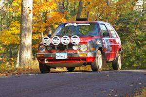 John Kimmes / Paul Peters take it easy at the midpoint jump on SS14, Brockway 2, in their VW GTI.