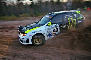 Ken Block / Alex Gelsomino drift nicely on their way to the finish of SS17, Gratiot Lake 2, in their Subaru WRX STi.