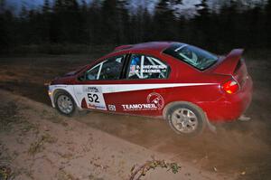 Doug Shepherd / Karen Wagner drift through the spectator corner at Gratiot Lake 2, SS17, in their Dodge SRT-4.