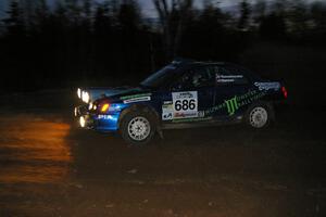 Heath Nunnemacher / Travis Hanson drift their Subaru WRX through the spectator corner on SS17, Gratiot Lake 2, near the finish.