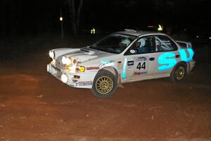 Henry Krolikowski / Cindy Krolikowski drift nicely past the spectator point on Gratiot Lake 2, SS17, in their Subaru Impreza.