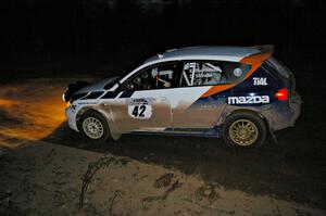 Eric Burmeister / Dave Shindle drift through the final corner of Gratiot Lake 2, SS17, in their Mazda Speed 3.