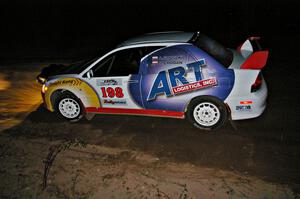 Arkadiusz Gruszka / Michal Chodan drift through the spectator point on SS17, Gratiot Lake 2, in their Mitsubishi Lancer Evo 9.