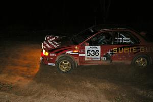 Matt Marker / Ben Slocum	take the final corner of Gratiot Lake 2, SS17, in their Subaru Impreza.